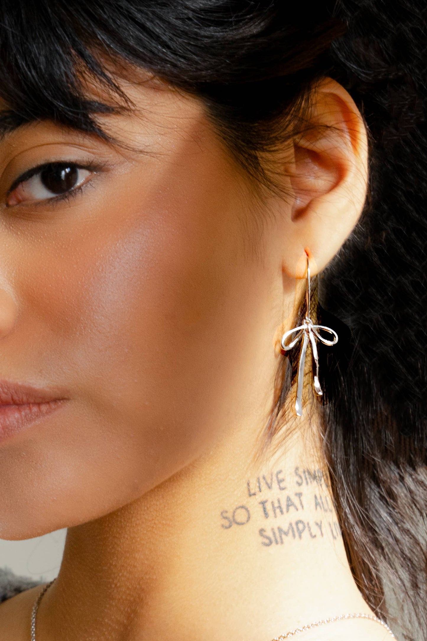 Bad to the Bow Earrings in Silver