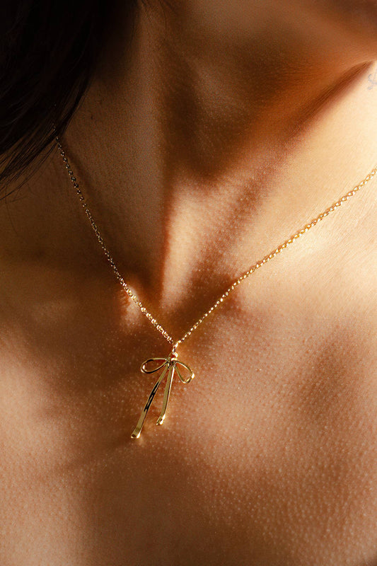 Bad to the Bow Necklace in Gold