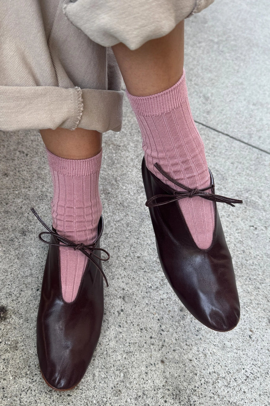 Her Socks in Desert Rose
