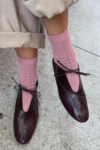 Her Socks in Desert Rose