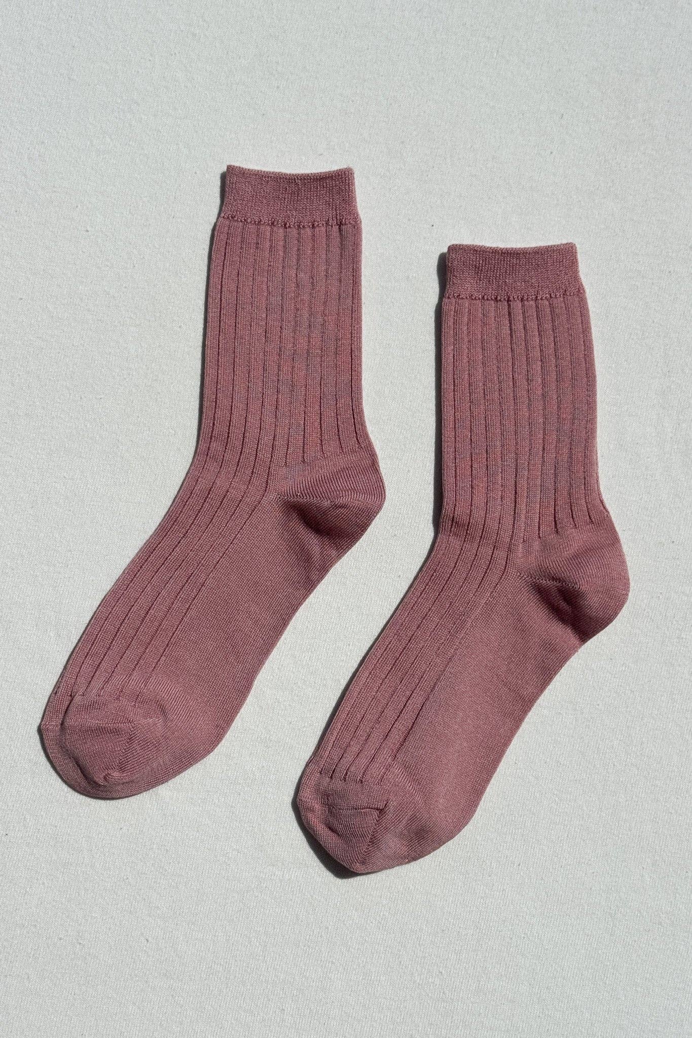 Her Socks in Desert Rose