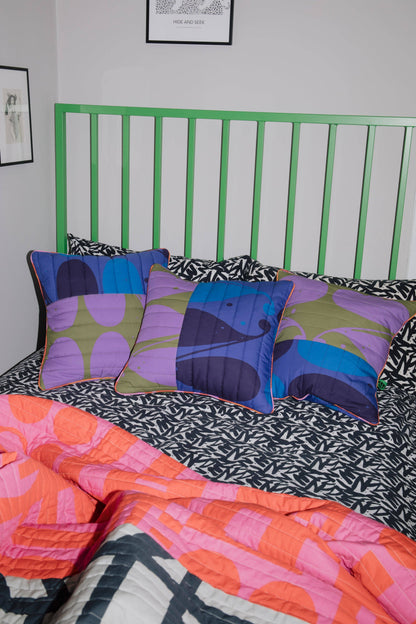 Quilted Cushion in Barbarian Cosmic