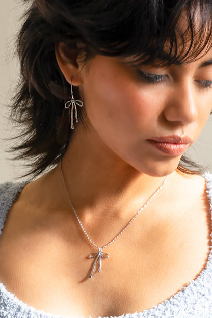 Bad to the Bow Earrings in Silver
